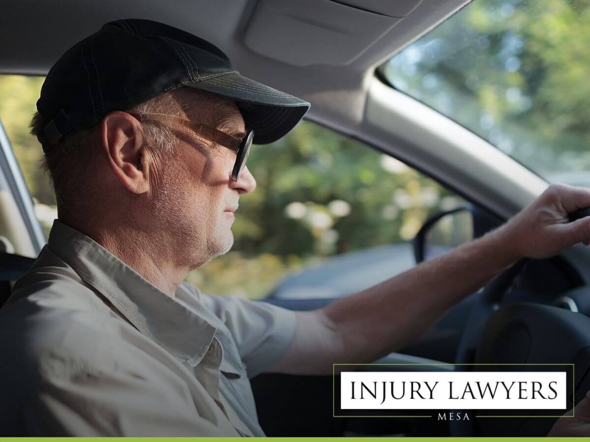 Older man driving his car